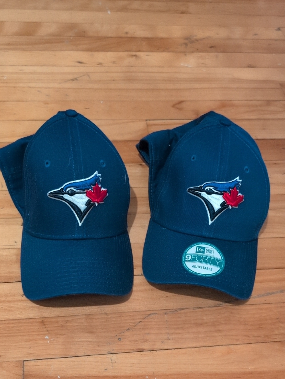 Two New Era Toronto Blue Jays Navy Blue Baseball Hats with Red Maple Leaf